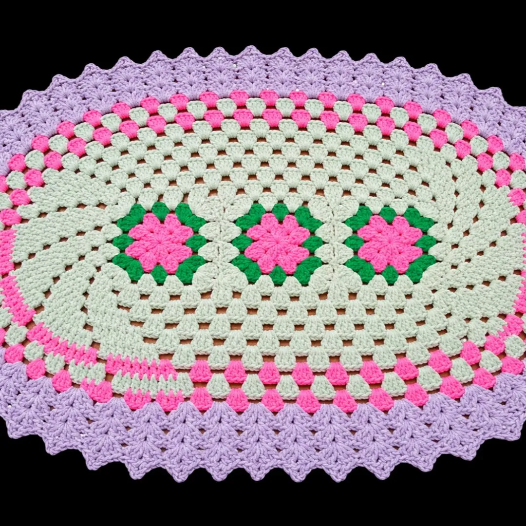 Tapete de crochê aspiral com flores