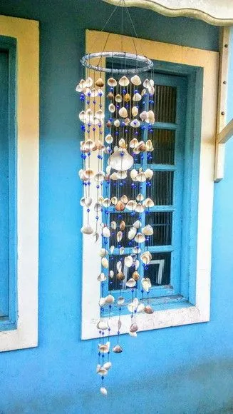 Sino Dos Ventos Conchas Naturais Mobile Com Perolas Azuis.